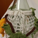 Paricolare coprifiasco con Vite, lavorati a mano, crochet e tricotin